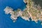 Aerial view of Assos peninsula and fantastic turquoise and blue Ionian Sea water. Top view, summer scenery of famous and