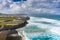 Aerial view of Atlantic coast at Ribeira Grande. Blue water and clouds. Island of Sao Miguel, Azores Islands, Portugal, Europe