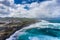 Aerial view of Atlantic coast at Ribeira Grande. Blue water and clouds. Island of Sao Miguel, Azores Islands, Portugal, Europe