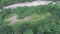 Aerial view of the ATV camp in the forest near the mountain river