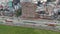 Aerial view of avenue with people crossing the street with a public bus called Transmilenio in the city of BogotÃ¡. Colombia