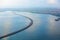 Aerial view of Bali Mandara toll road over sea gulf