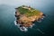 Aerial view of the Ballycotton lighthouse in county Cork, Ireland, at sunrise