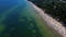 Aerial view of Baltic Sea beach with swimming people in Wladyslawowo, Poland