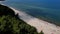 Aerial view of Baltic Sea beach with swimming people in Wladyslawowo, Poland