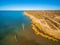 Aerial view of bare trees in waters of Lake Bonnie.