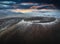 Aerial view of the barren Uran Togoo dead volcano at sunset