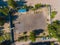 Aerial view basketball field on day time on the beach. Above with drone