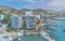 Aerial view of the bay, marina and buildings of Ancon - Lima, Peru; The beach and some exterior buildings in Ancon