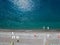 Aerial view of a beach with canoes, boats and umbrellas. Praia a Mare, Province of Cosenza, Calabria, Italy