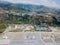 Aerial view of a beach with canoes, boats and umbrellas. Praia a Mare, Province of Cosenza, Calabria, Italy