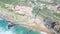 Aerial view of beach and cliffs next to Azenhas do Mar Village.