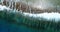 Aerial view of beach and coral reef lagoon and blue water in South Pacific Ocean