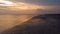 Aerial view of beach during golden hour in Sekinchan, Selangor, Malaysia.