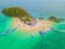 Aerial view of beach at Koh Khai, a small island, with crowd of people, tourists, blue turquoise seawater with Andaman sea in