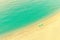 Aerial view of beach lounge with umbrellas on tropical golden paradise beach with turquoise waters