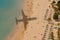 Aerial View of beach with shadow of airplane