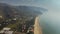 Aerial view of the beach in Sperlonga and surrounding mountains, Italy