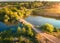 Aerial view of beautiful countryside at sunset. Summer landscape