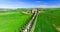 Aerial view of beautiful cypress road in Tuscany at spring