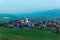 Aerial view of beautiful Ellmau at dusk on a foggy summer evening, a lovely alpine village