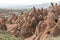 aerial view of beautiful eroded rock formations at cloudy day,