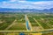 Aerial view of beautiful fertile Neretva valley surrounded by mountains, garden of Dubrovnik, daytime landscape, Croatia