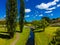 Aerial view of a beautiful green park with a narrow river in Armidale Australia