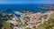 Aerial view of beautiful houses and trees on the seashore in Zminj, Croatia