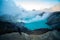 Aerial view of beautiful Ijen volcano with acid lake and sulfur gas going from crater