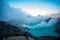 Aerial view of beautiful Ijen volcano with acid lake and sulfur gas going from crater