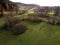 Aerial view of a beautiful land covered in greens and trees - great for wal