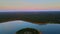 Aerial view of beautiful landscape forest on sunset on lake