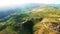 Aerial view on the beautiful landscape, sunshine in the mountains, forest and blue sky