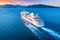 Aerial view of beautiful large white ship at sunset