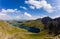 Aerial view of a beautiful mountain lake and hiking tracks near Snowdon, Wales Miner`s Track and Llyn Llydaw