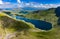 Aerial view of a beautiful mountain lake and hiking trail Llyn Llydaw and Miners track, Snowdon