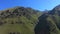 Aerial view of a beautiful mountain waterfall. Summer landscape in the mountains.