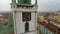 Aerial view of beautiful old clock on gothic city hall tower, historic landmark