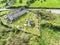 Aerial view of a beautiful old ruins of an Irish church and graveyard