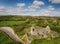 Aerial view of a beautiful old ruins of an Irish church and graveyard