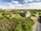 Aerial view of a beautiful old ruins of an Irish church and graveyard