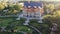 Aerial view. Beautiful park. Fountains, lakes, decorative trees. house