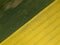 Aerial view of a beautiful rural area with yellow and green fields with rapeseed and wheat