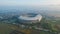 Aerial view of the Beautiful scenery Gelora Bandung Lautan Api GBLA Football or Soccer Stadium in the Morning with Blue Sky.