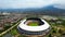 Aerial view of the Beautiful scenery Gelora Bandung Lautan Api GBLA Football or Soccer Stadium in the Morning with Blue Sky.