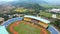 Aerial view of the Beautiful scenery Si Jalak Harupat Football or Soccer Stadium in the Morning with Blue Sky. Bandung, Indonesia