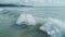 Aerial view of beautiful sea waves near the beach