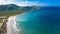 Aerial view of the beautiful sunny Bahia de Patanemo beach in Puerto Cabello, Venezuela