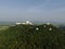 An aerial view of Beautiful Temple on the mountain stands prominently at Wat Nong Hoi in Ratchaburi near the Bangkok, Thailand.